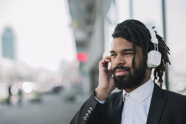 Handsome man listening to music