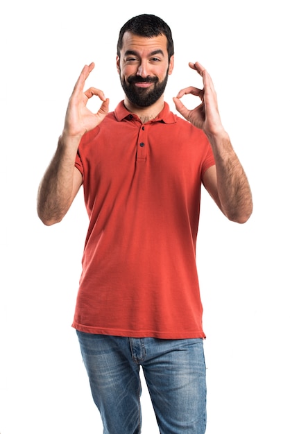 Handsome man making OK sign