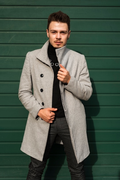 Handsome man posing outdoors