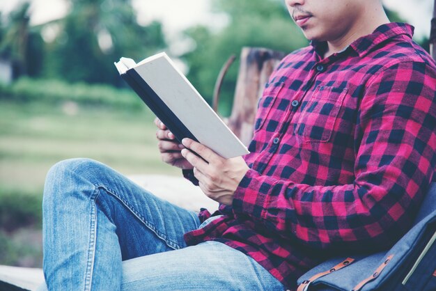 Handsome man relax in the travel nature