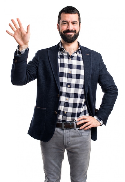 Handsome man saluting