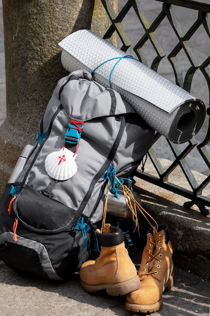 Free Photo handsome man traveling with his backpack