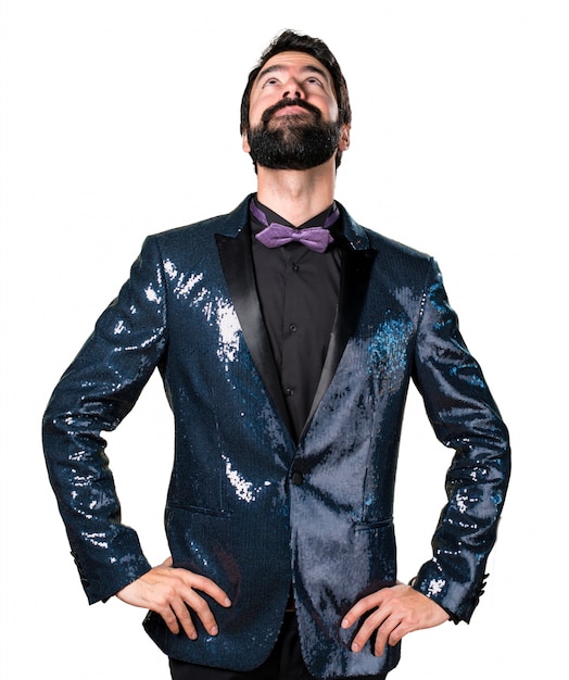 Free photo handsome man with sequin jacket looking up