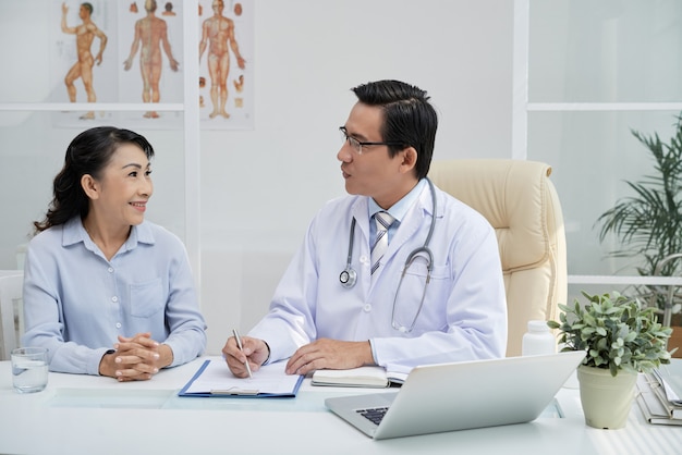 Handsome Physician Having Appointment