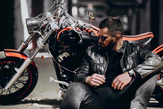 Handsome sexy man on motorbike