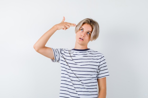 Handsome teen boy in a striped t-shirt