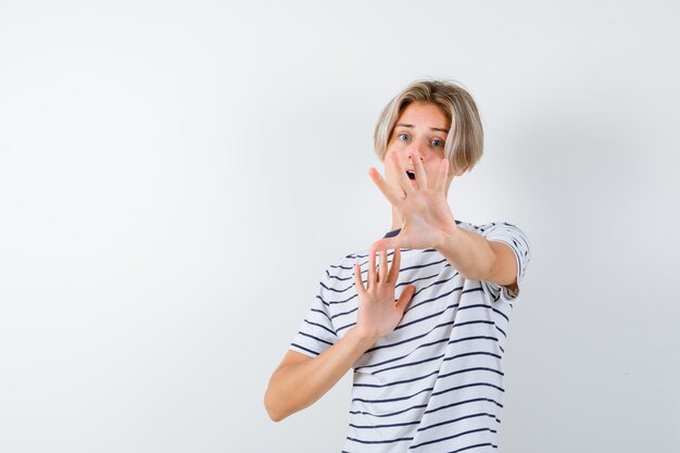 Handsome teen boy in a striped t-shirt