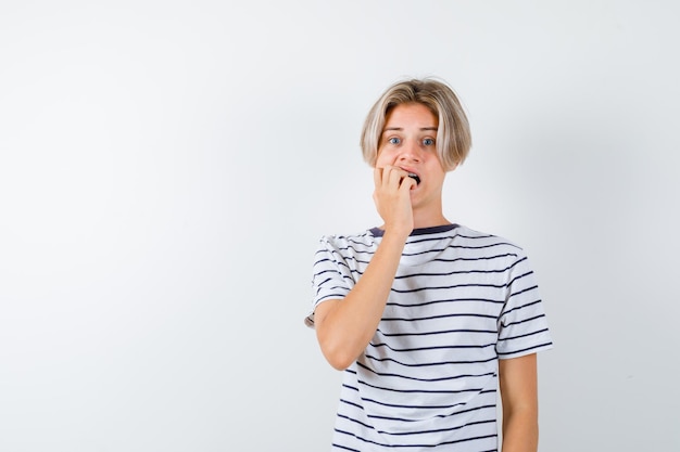 Free Photo handsome teen boy in a striped t-shirt