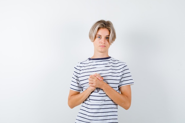 Handsome teen boy in a striped t-shirt