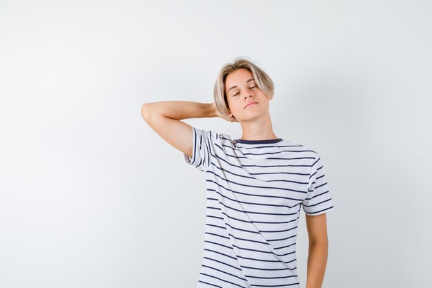 Handsome teen boy in a striped t-shirt