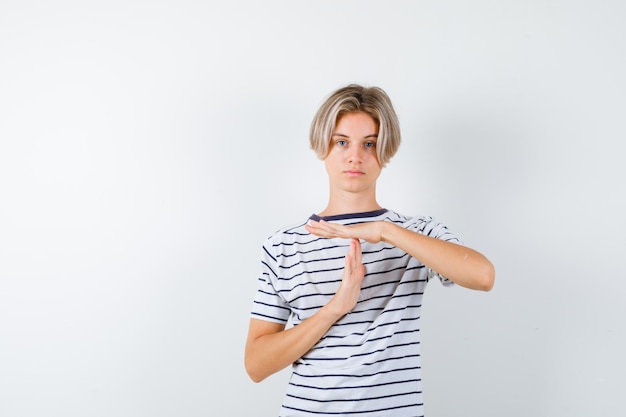 Free Photo handsome teen boy in a striped t-shirt