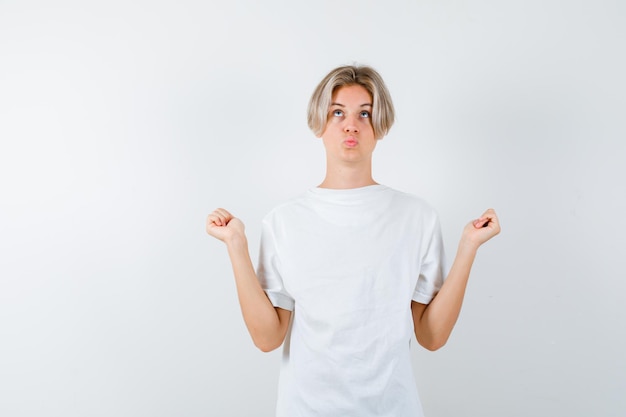 Handsome teen boy in a white t-shirt