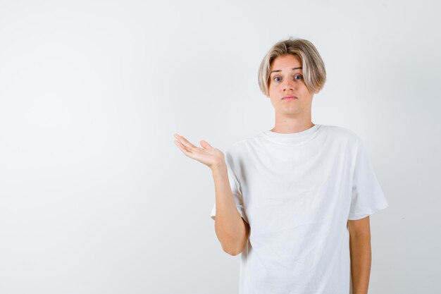 Handsome teen boy in a white t-shirt