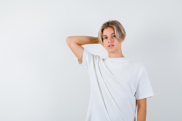 Handsome teen boy in a white t-shirt