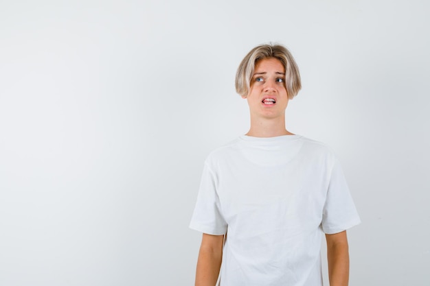 Free Photo handsome teen boy in a white t-shirt