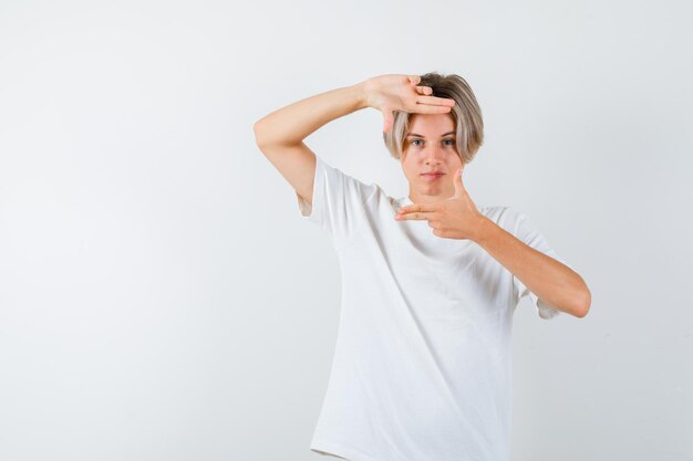 Handsome teen boy in a white t-shirt