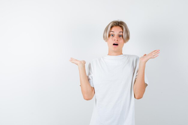 Handsome teen boy in a white t-shirt