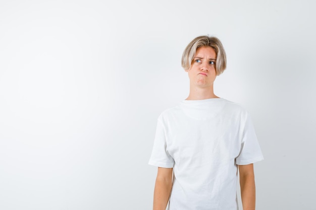 Free Photo handsome teen boy in a white t-shirt