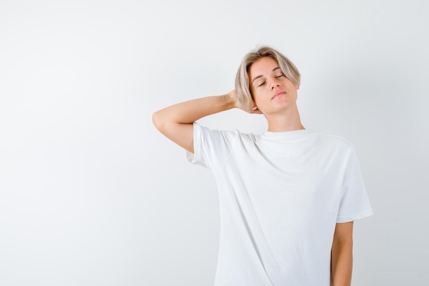 Free Photo handsome teen boy in a white t-shirt