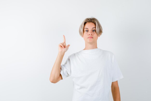 Handsome teen boy in a white t-shirt