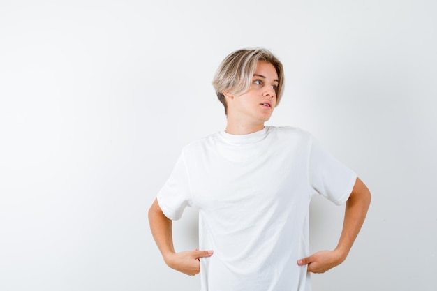 Free Photo handsome teen boy in a white t-shirt