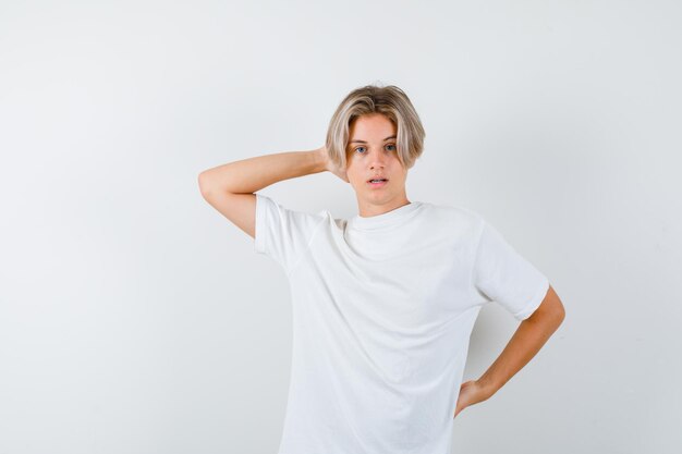 Handsome teen boy in a white t-shirt