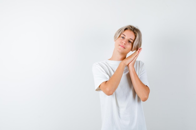 Handsome teen boy in a white t-shirt