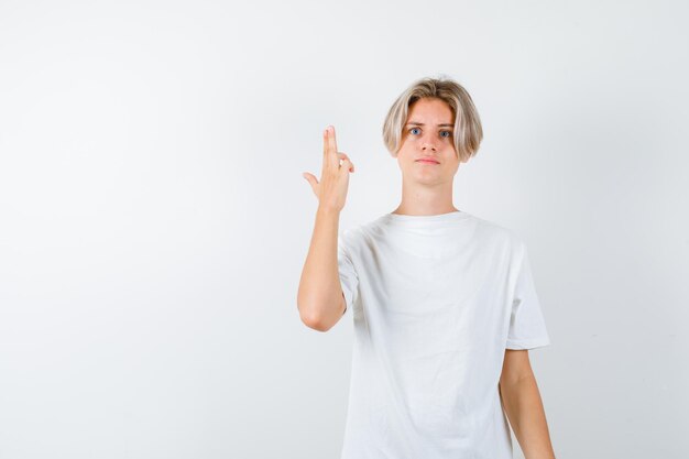 Handsome teen boy in a white t-shirt