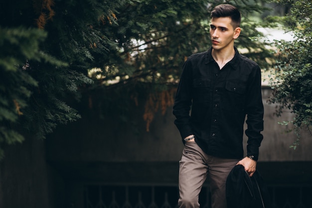 Handsome young man in park