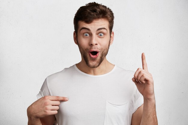 Handsome young man in white T-shirt