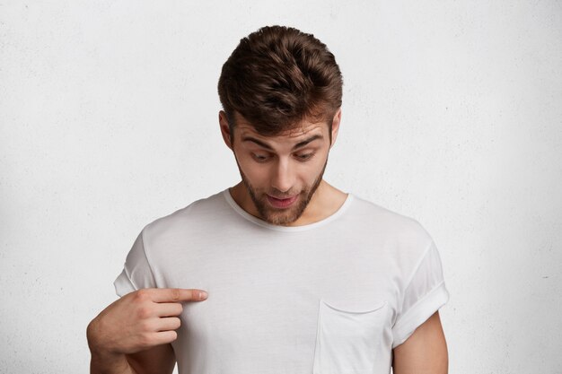 Handsome young man in white T-shirt