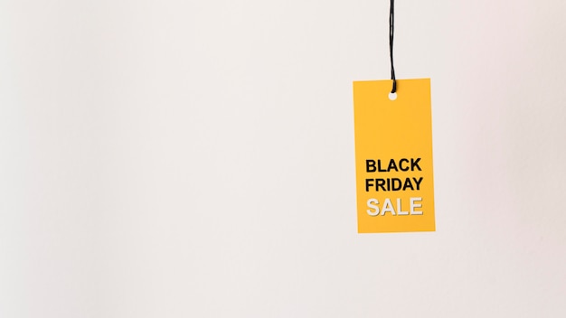 Free photo hanging yellow black friday sale label copy space