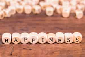 Free photo happiness concept over wooden table