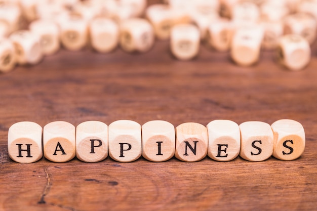 Free Photo happiness concept over wooden table