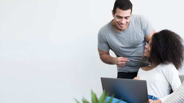 Happy adult male and woman working together