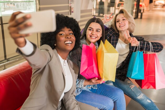 Happy adult women taking a selfie