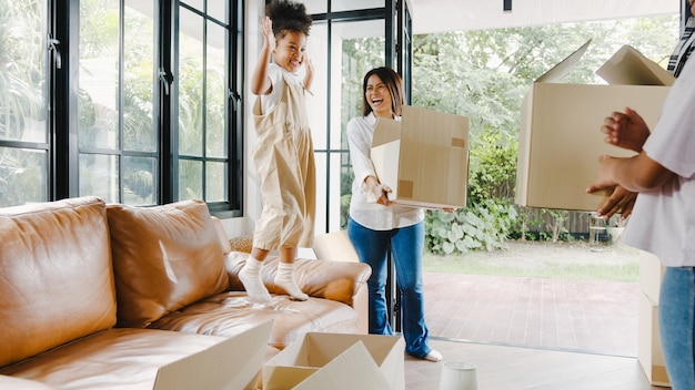 Free photo happy african american young family bought new house.