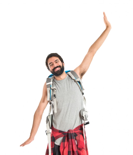 Free photo happy backpacker over isolated white background