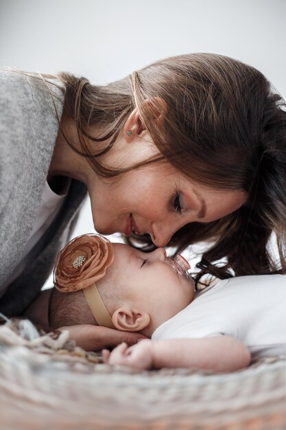 happy beautiful mother and baby indoor