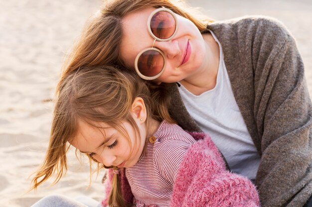 Happy beautiful mother and daughter