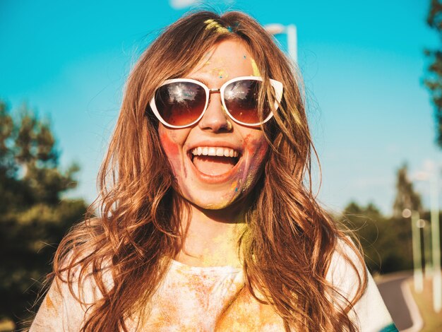 Happy beautiful woman after party at Holi colors festival