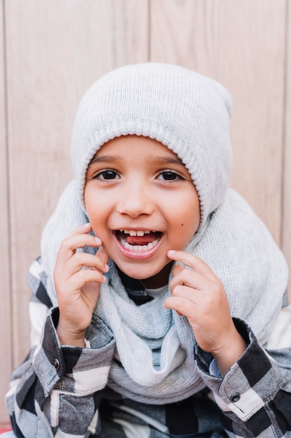 Free photo happy boy in winter clothes