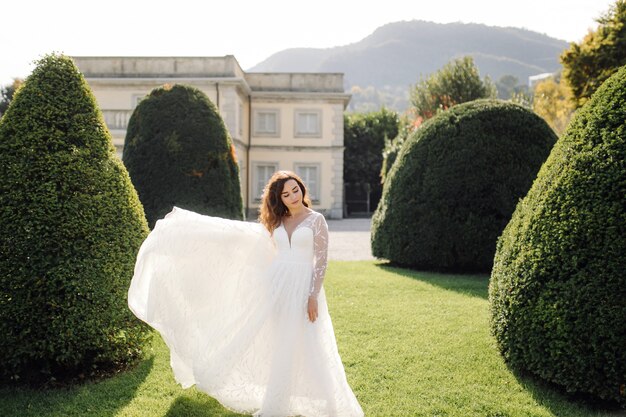 Free Photo happy bride woman in a wedding dress posing