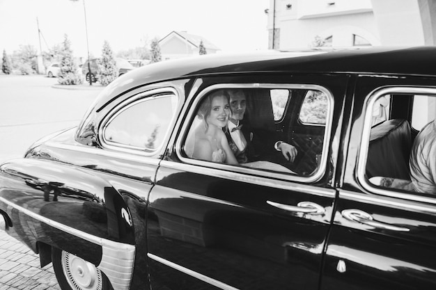 Free Photo happy bridesmaids riding in a car