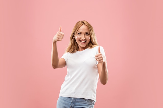 The happy business woman standing and smiling