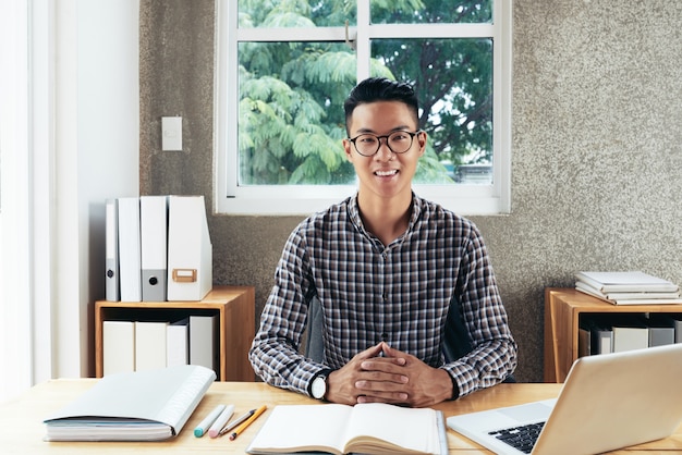 Happy businessman at work