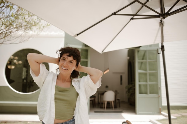 Happy caucasian woman smiling at camera