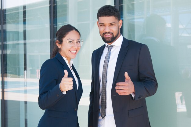 Happy confident business partners enjoying teamwork