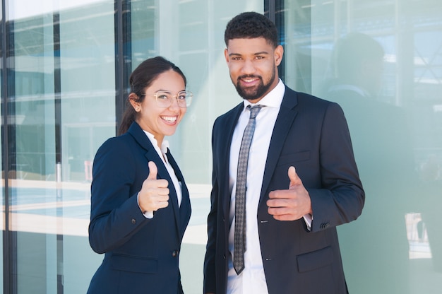 Happy confident business partners enjoying teamwork