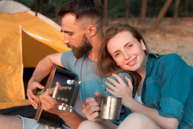 Happy couple enjoying music 